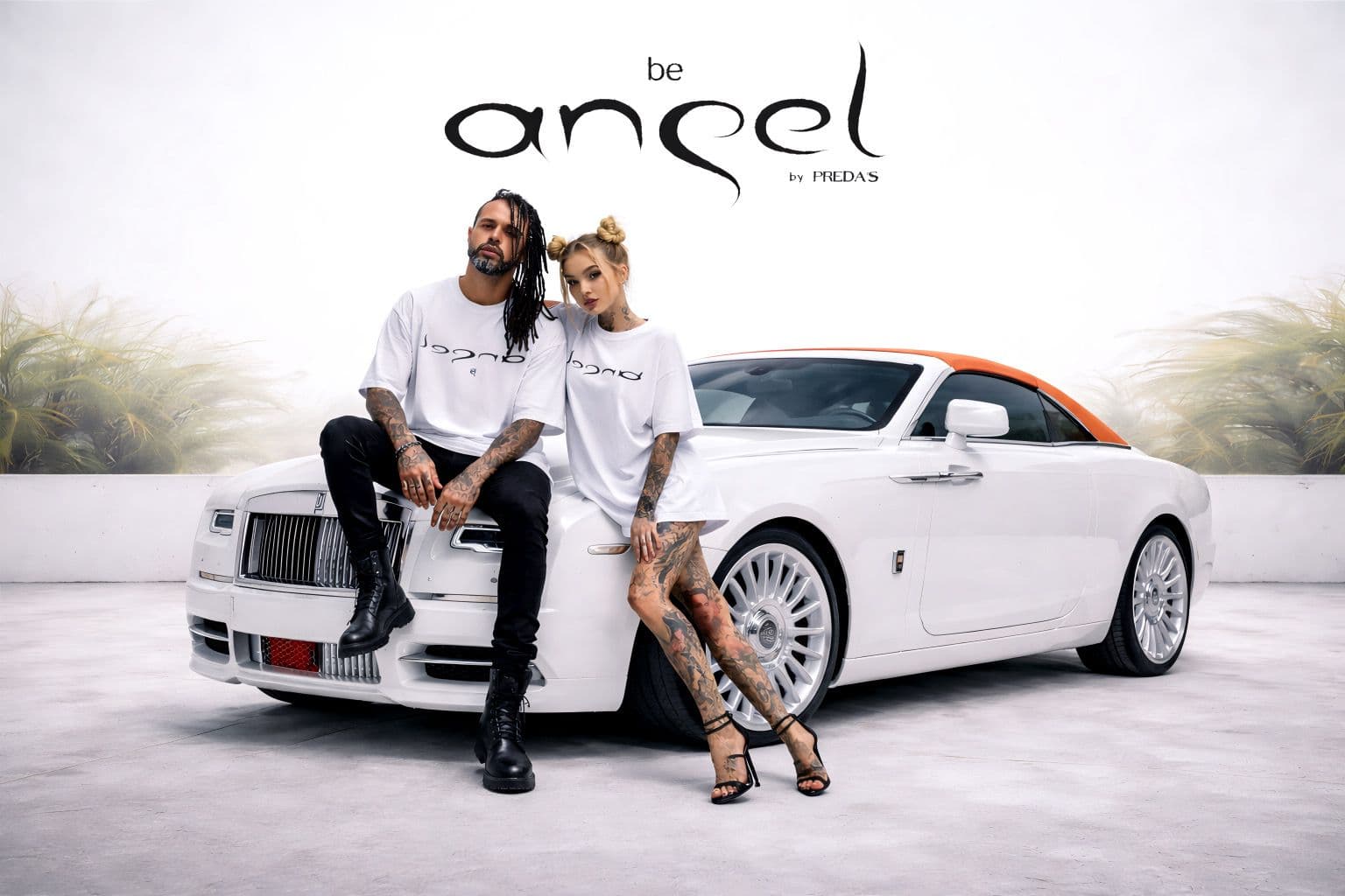 Be Angel by Preda's campaign — two models beside a white Rolls-Royce